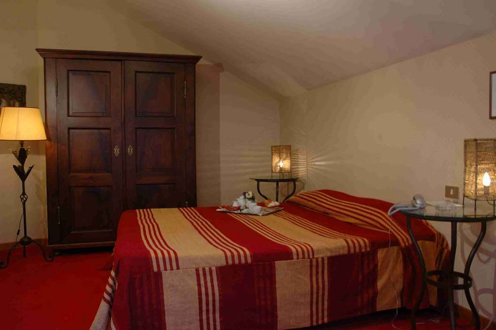 Hostellerie Du Golf Pecetto Habitación foto