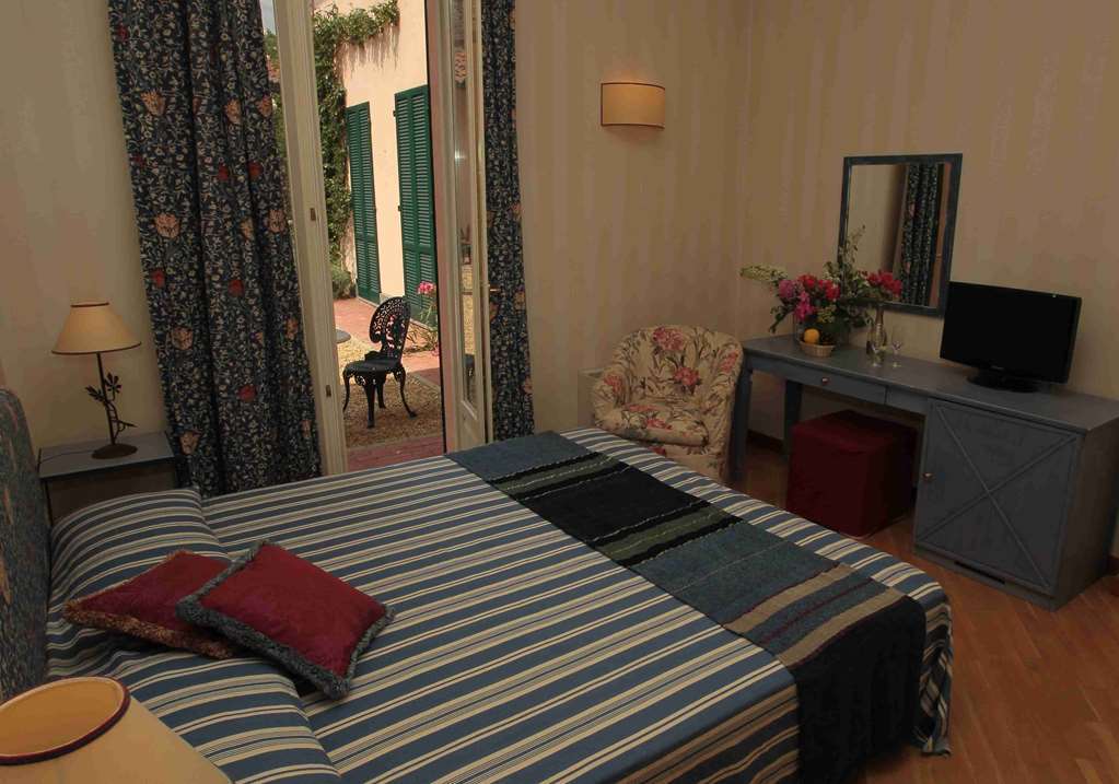 Hostellerie Du Golf Pecetto Habitación foto